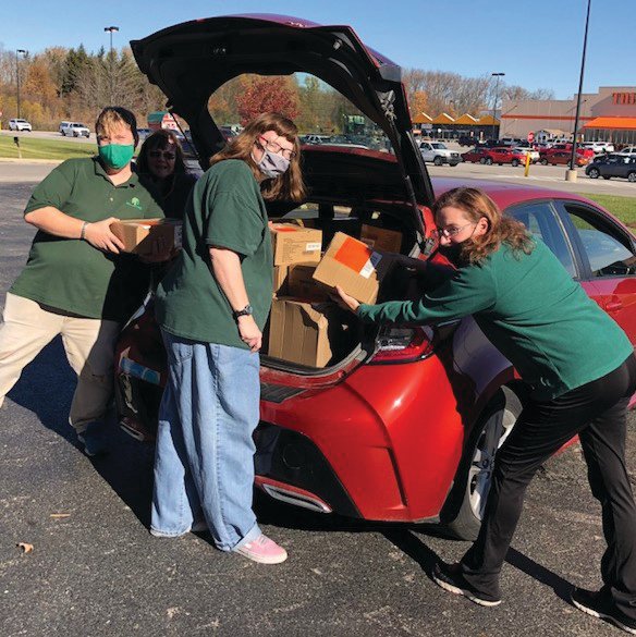 Dollar Tree employees load up donated toiletries for Volunteers for Mental Health in Montgomery County